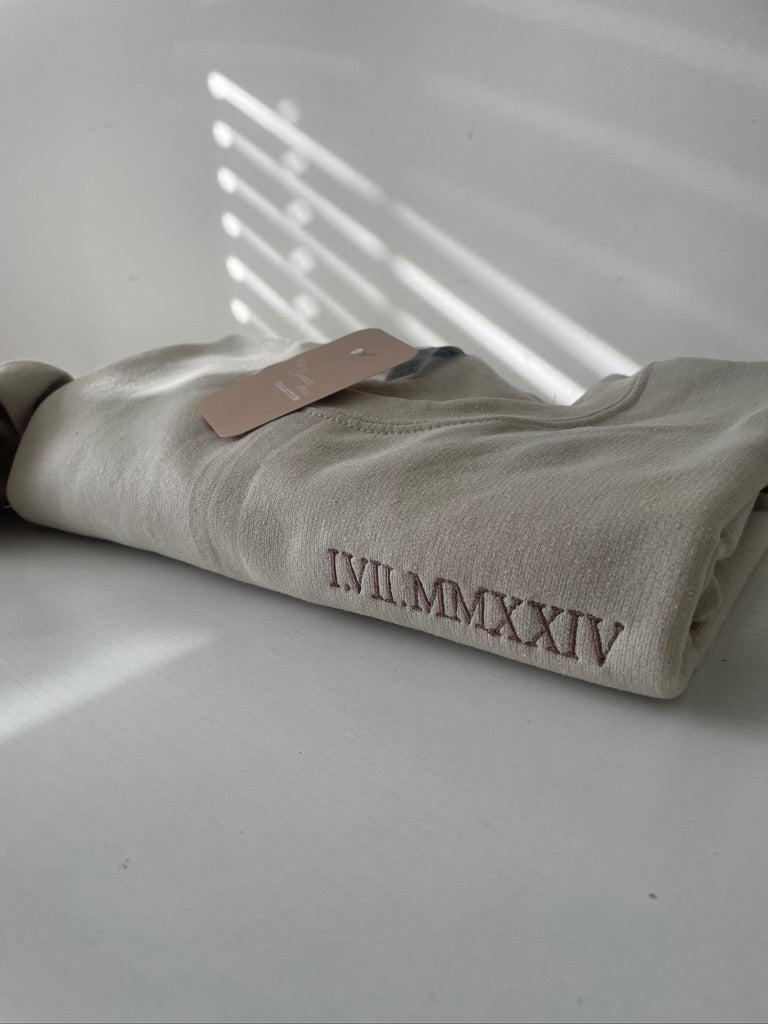 Beige roman numerals sweatshirt