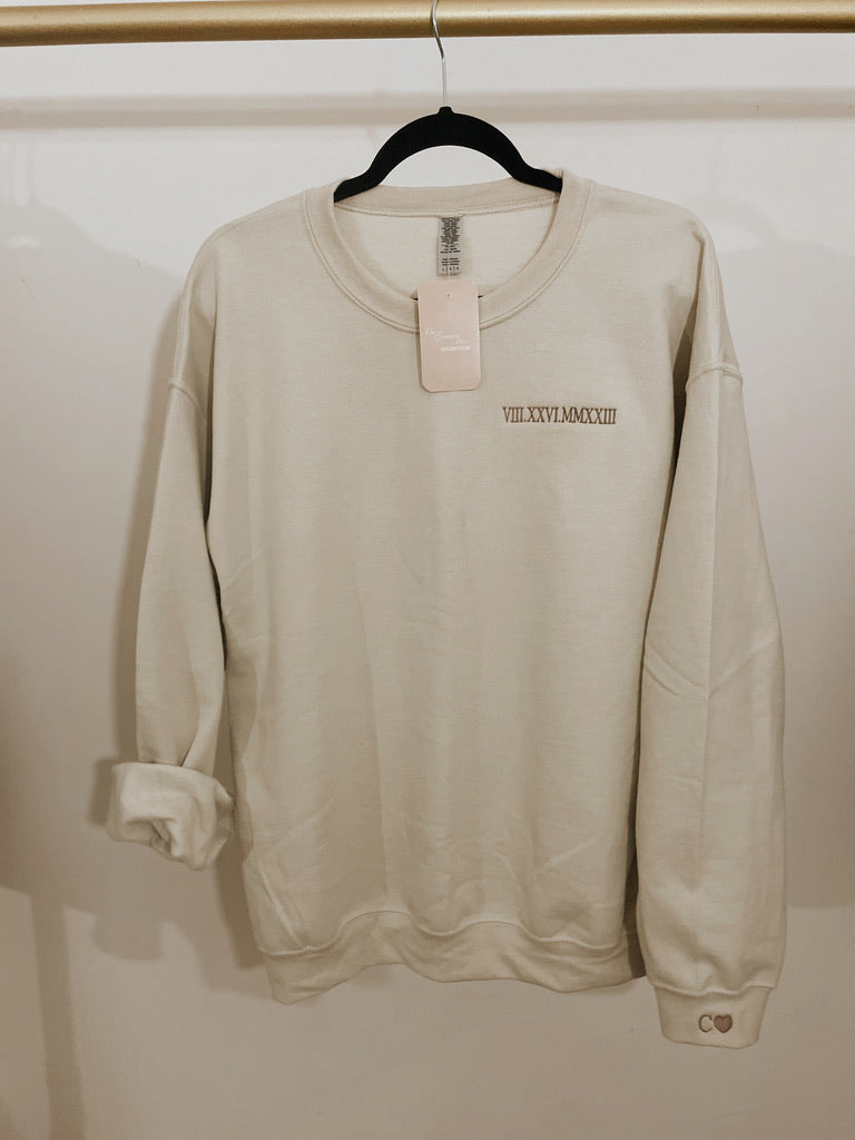 Beige roman numerals sweatshirt