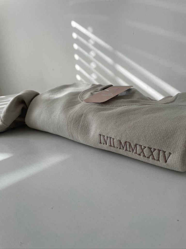 Beige roman numerals sweatshirt